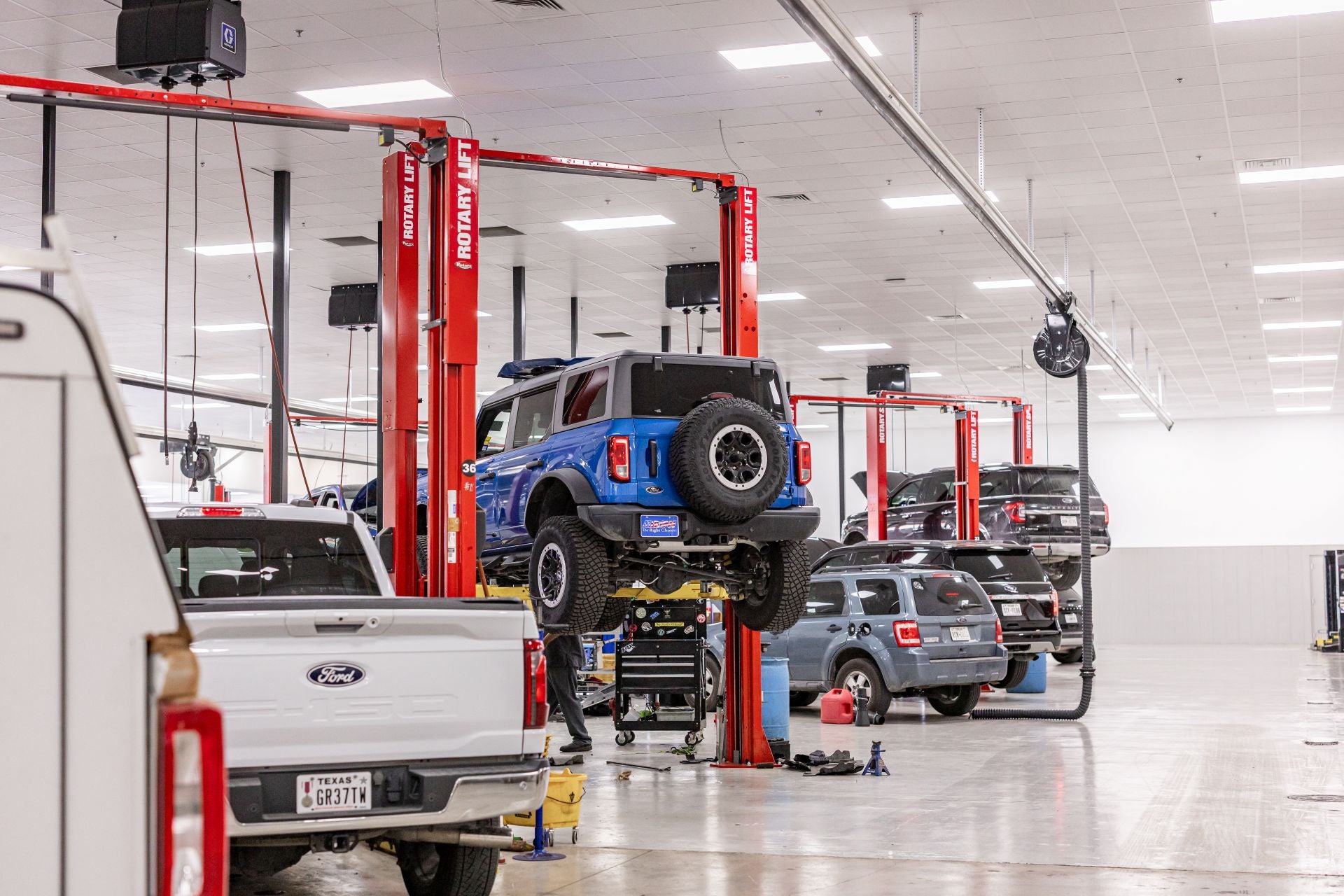 Ford Bronco on the lift in a service bay