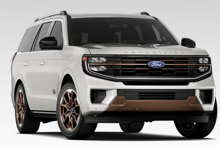 Front view of a white Ford Expedition with distinctive bronze accents and rugged styling.