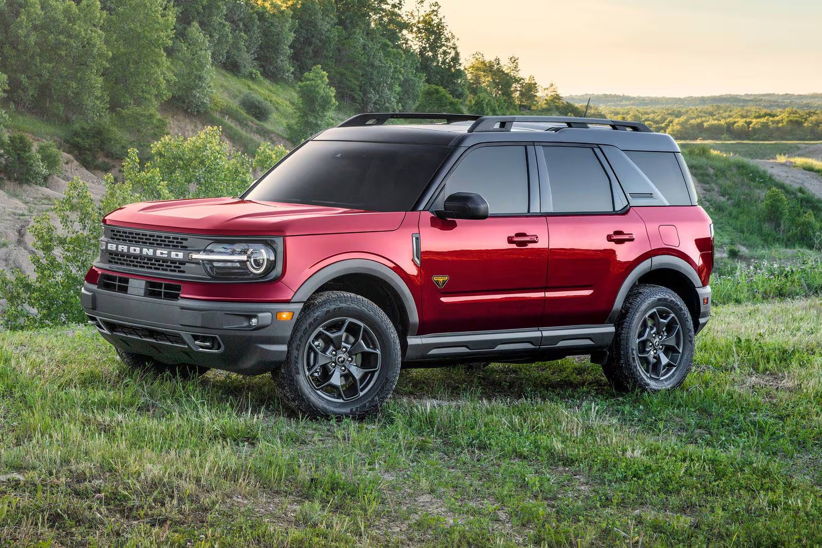 A red bronco sport sitting parked.