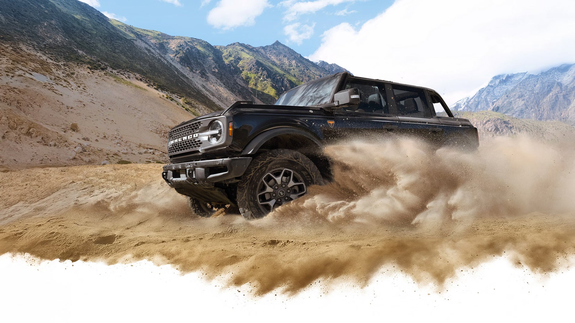 A 2026 Ford Bronco driving in the desert
