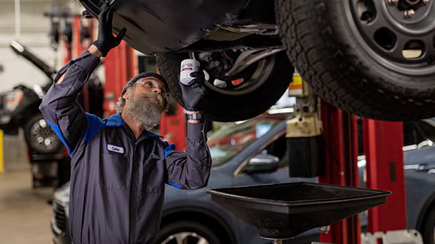 View of a man working on a 2026 Ford Maverick