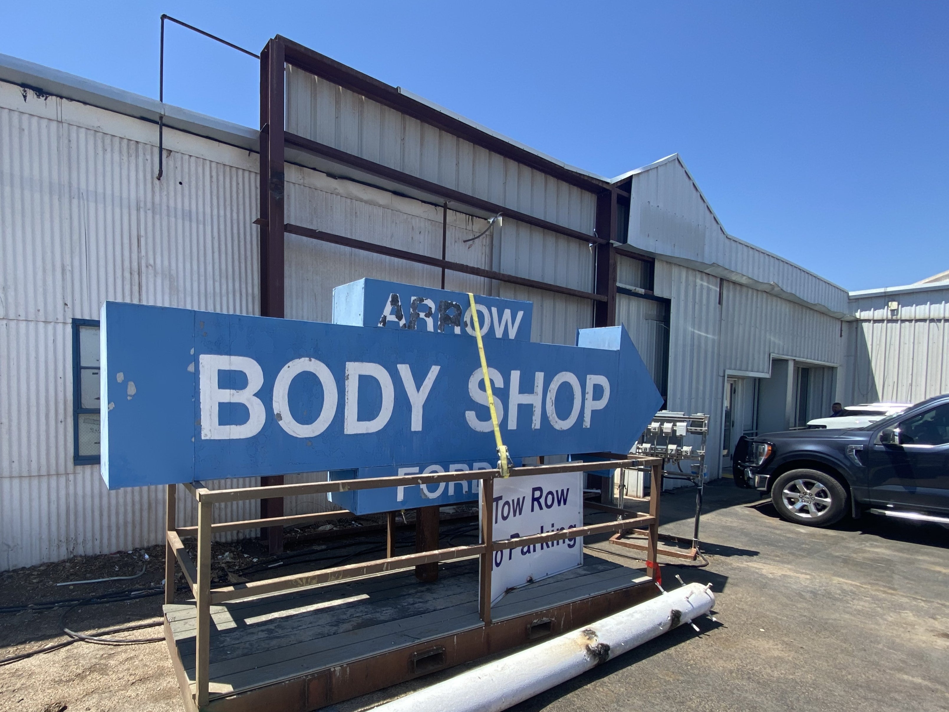 Arrow Renovation Body Shop Sign Removed